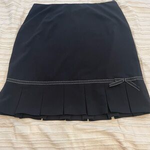 Elegant Black Skirt with Bow Detail. Nygard size 34 waist. Knee length. Preppy